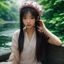 旅行达人Lily头像，年轻女性旅行博主面带笑容，热爱探索亚洲顶级度假目的地